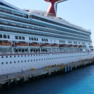 Backing into the pier next to the Carnival Liberty