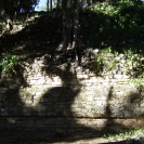Some of the stone structure of the Gran Basamento sticking out from under the hill