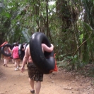 Walking through the forest to get to the cave tubing spot