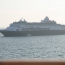 Holland America's Veendam with a tender next to it