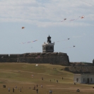 Lighthouse at El Morro with kites flying over it