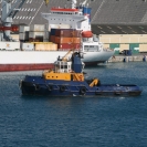 The Pelican II tug moving to escort the Caribbean Jade out of the port