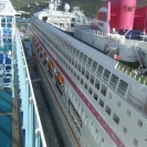 On the left, the Crown Princess.  On the right, the Ocean Village Two, which started life as the Crown Princess