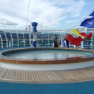 Taking down the flags over the Splash Pool