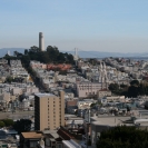 Looking across the city at Coit Tower from the top of Lombard Street