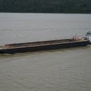 A tug pushing a barge