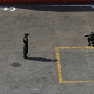 The guards taking pictures of themselves in front of our ship