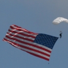 Parachutist bringing in the flag