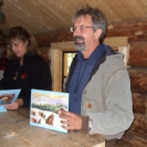 David Monson signing copies of the Granite kids book