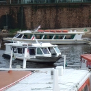 Speedboats maneuvering around the dock area