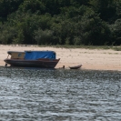 A beached boat along the Rio Negro