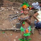 A kid with a caiman