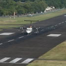 A DHC-8 taxiing on the runway