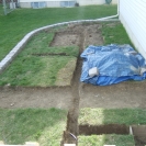 Patio, walkway, and sprinkler trenches dug out