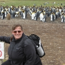 Cathy in front of the king penguins (carefully obeying the sign)