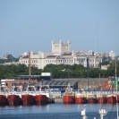Legislative Palace over a fleet of shipping vessels