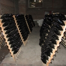 Sparkling wine being produced through the mothod champenoise